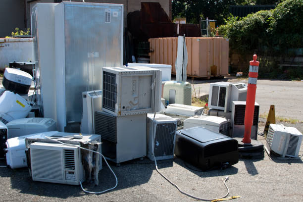 Pile of recycled Freon dependent items at the recycling yard.